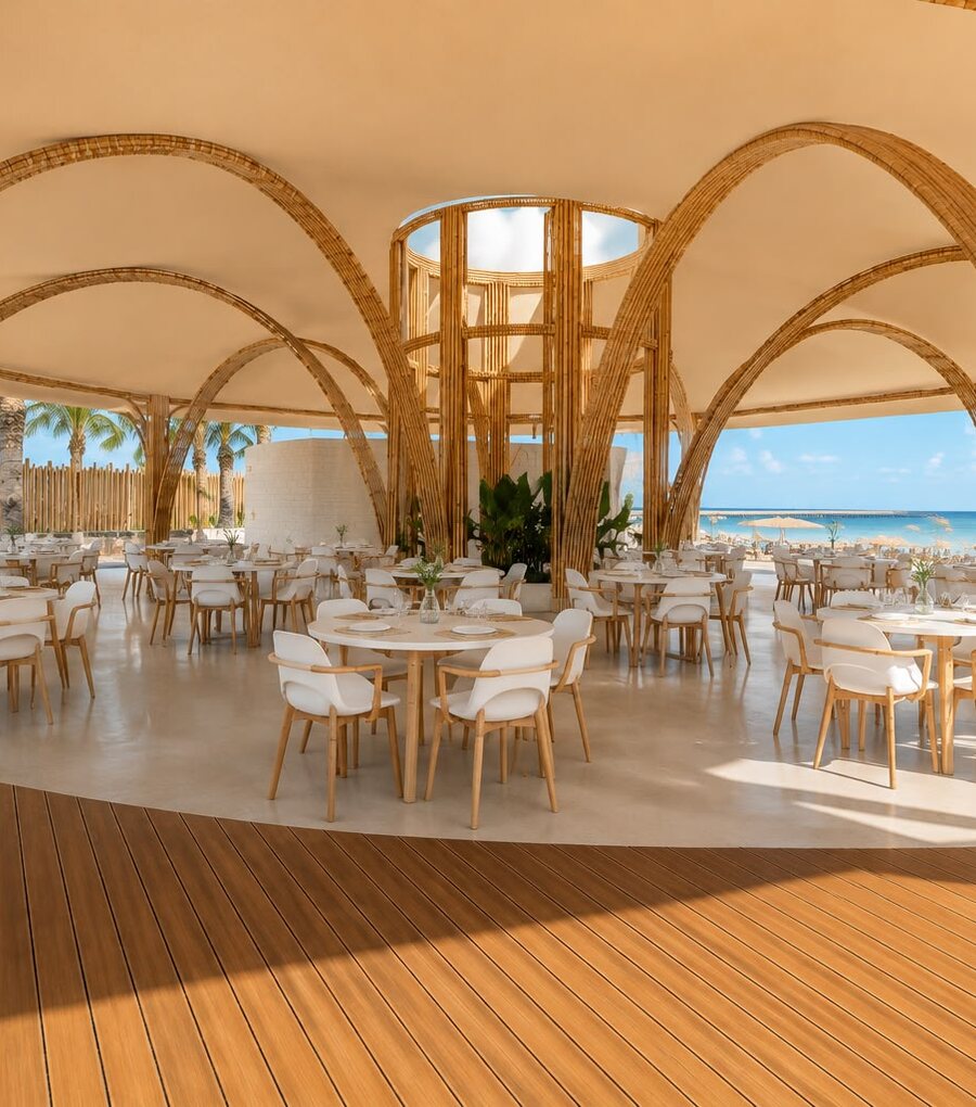 Restaurante de AQUALODGE bajo bóvedas de bambú frente al mar, Tumbes