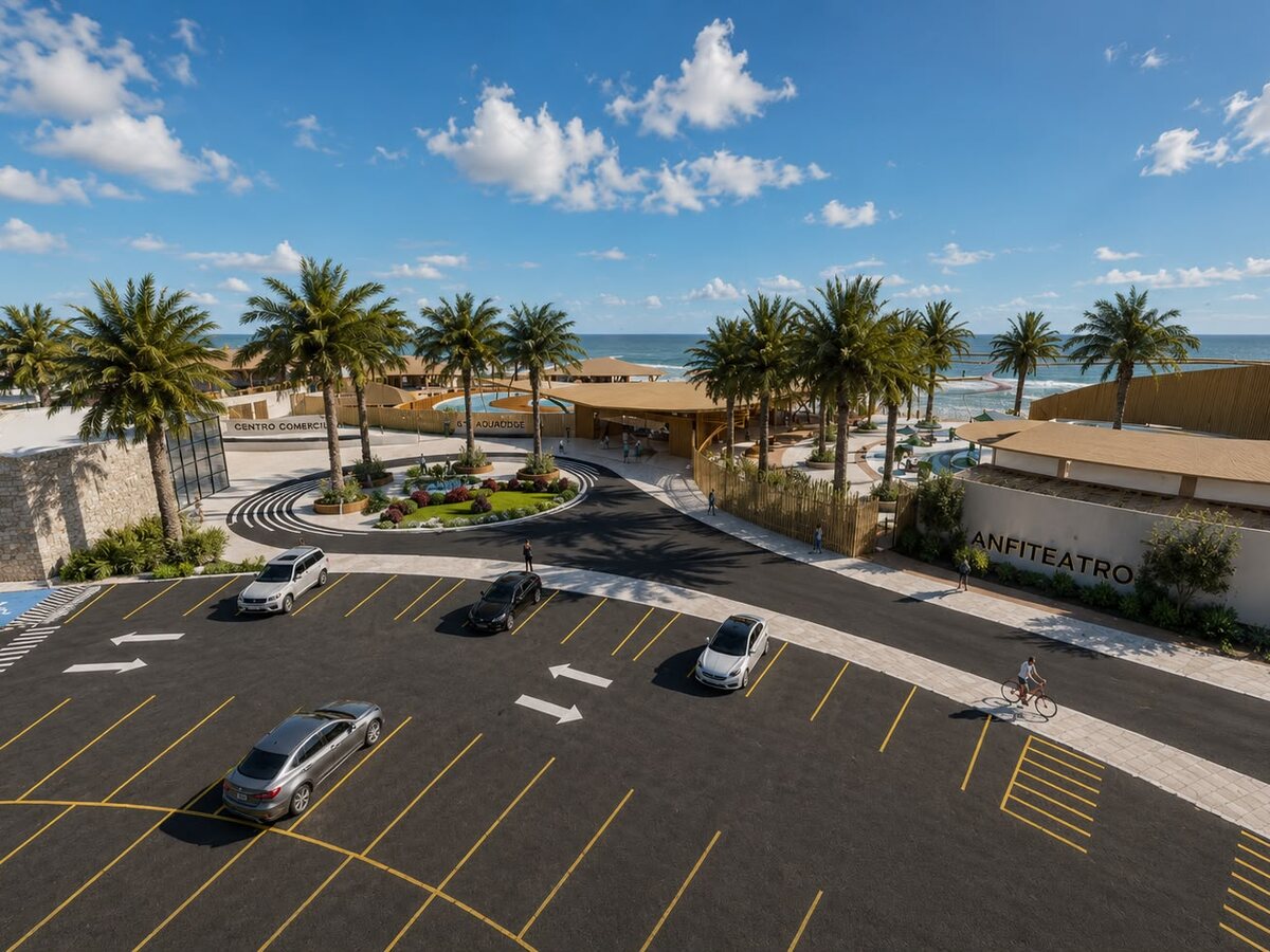 Vista aérea de AQUALODGE con el anfiteatro, los estacionamientos y el mar de Playa Hermosa al fondo